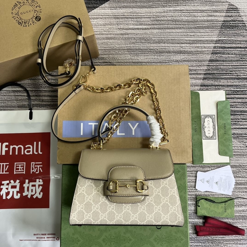 G*u*i top handle bags